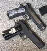 our Taurus PT-1911s.JPG